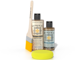 Two bottles of 'Retique It' wood care products with a brush and sample on a white background