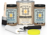 Retique It wood finish products including a can, jar, brush, and roller on a white background.