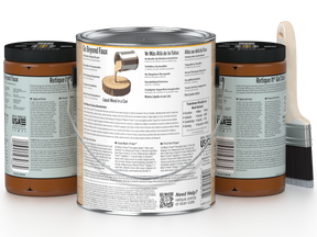 Three cans of paint with labels on a white background