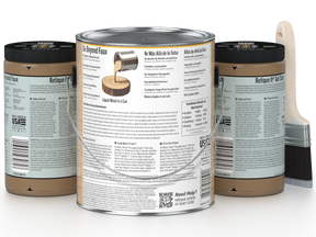 Three cans of paint with labels on a white background