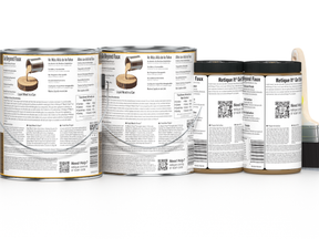 Five cans of Retique Atelier Calligraphy Faux on a white background