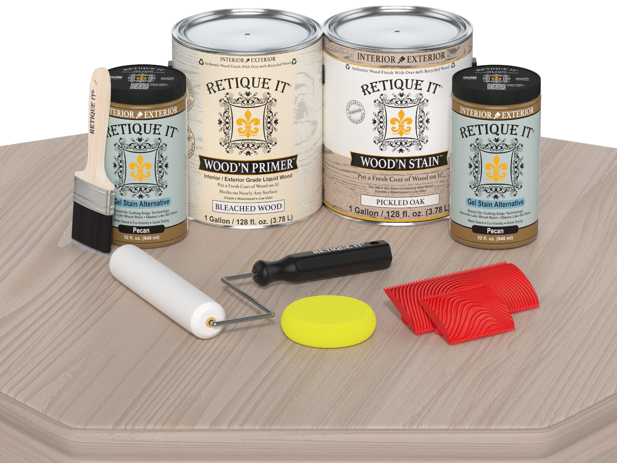 Retique It wood care products including cans, a brush, roller, and applicators on a wooden surface.