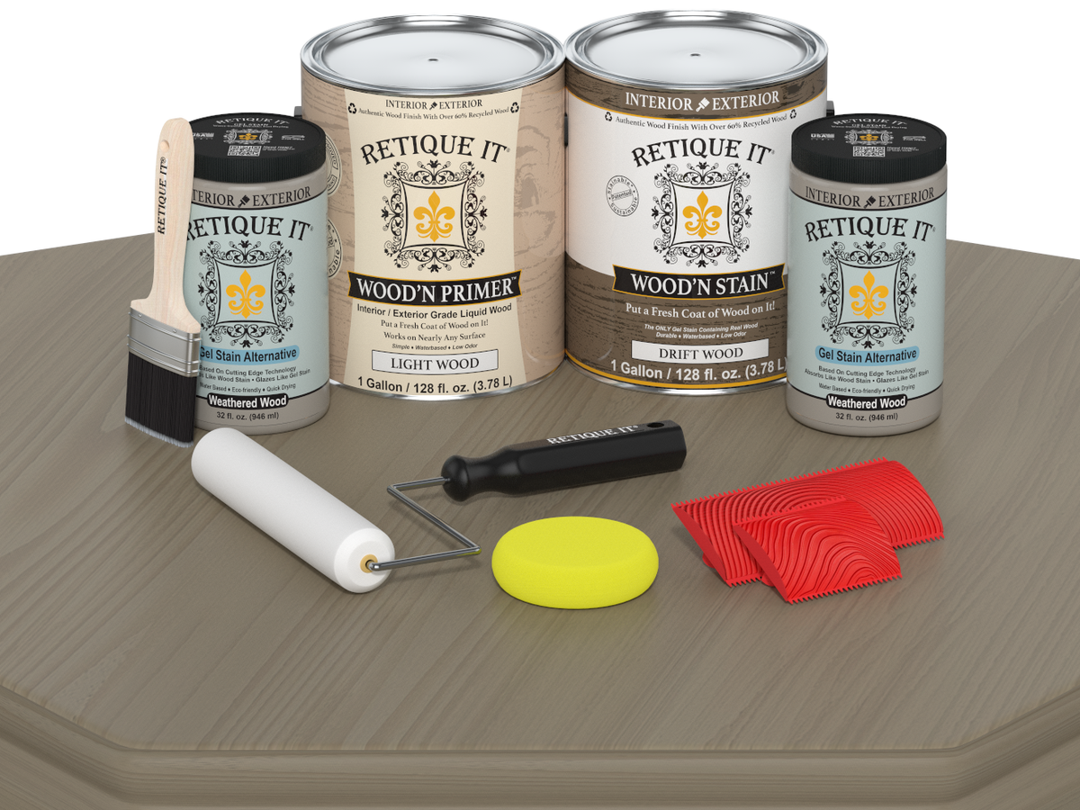 Retique It wood stain and primer set with application tools on a wooden surface