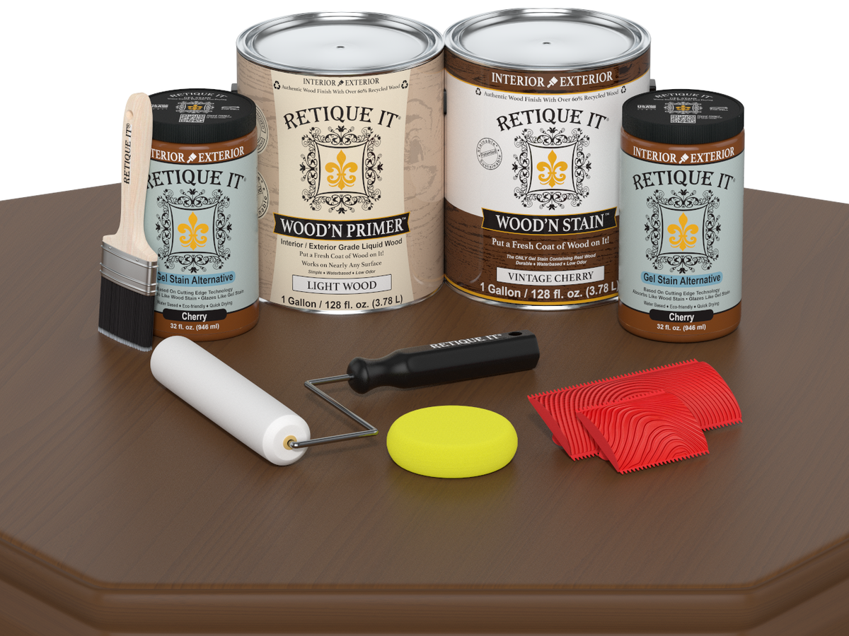 Retique It wood stain and primer set with application tools on a wooden surface