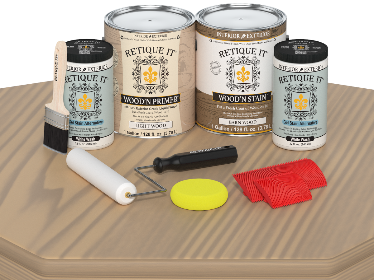 Retique It wood staining kit with cans, brush, roller, and applicators on a wooden surface.