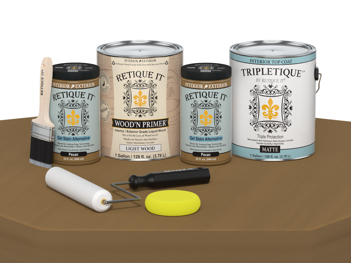 Collection of paint cans and painting tools on a brown surface