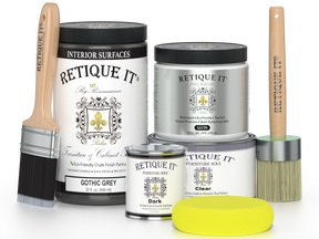 Retique It furniture paint and wax products with brushes and a sponge on a white background
