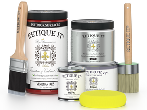 Retique It furniture paint and wax products with brushes and a sponge on a white background