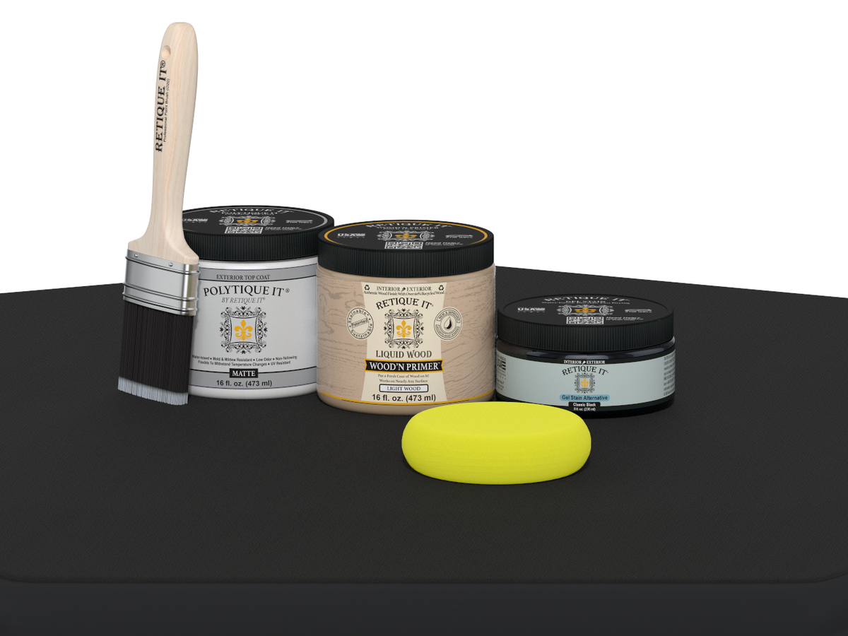 Collection of paint-related products including a brush, jars, and a bar on a black surface.