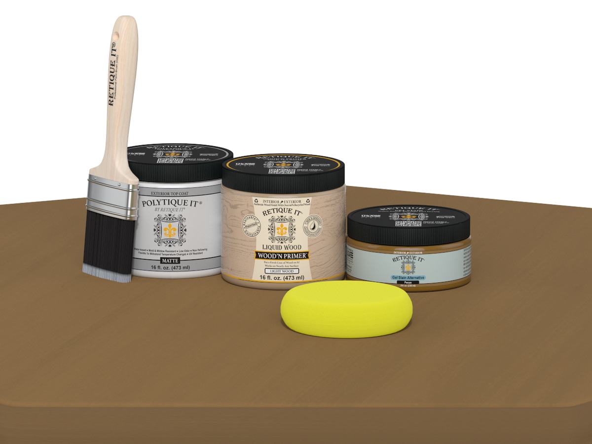 Collection of paint-related products including jars, a brush, and a sponge on a brown surface.