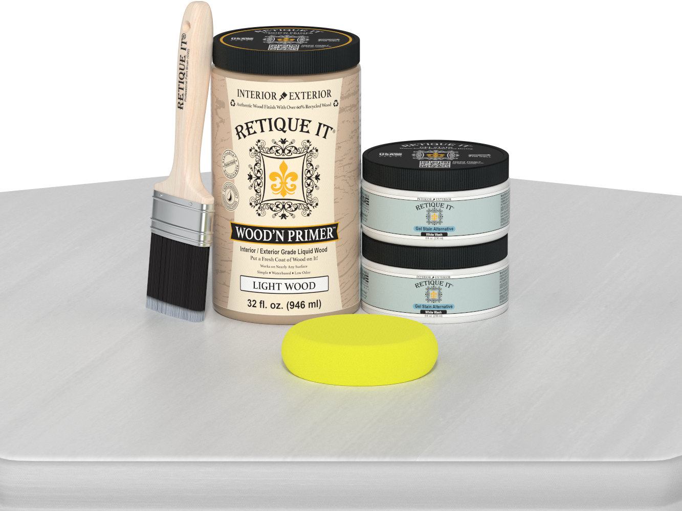 Retique It wood primer set with a brush and sponge on a white surface
