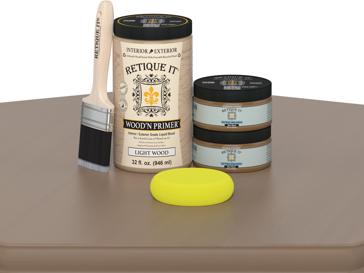 Retique It wood primer with a brush and yellow sponge on a brown surface