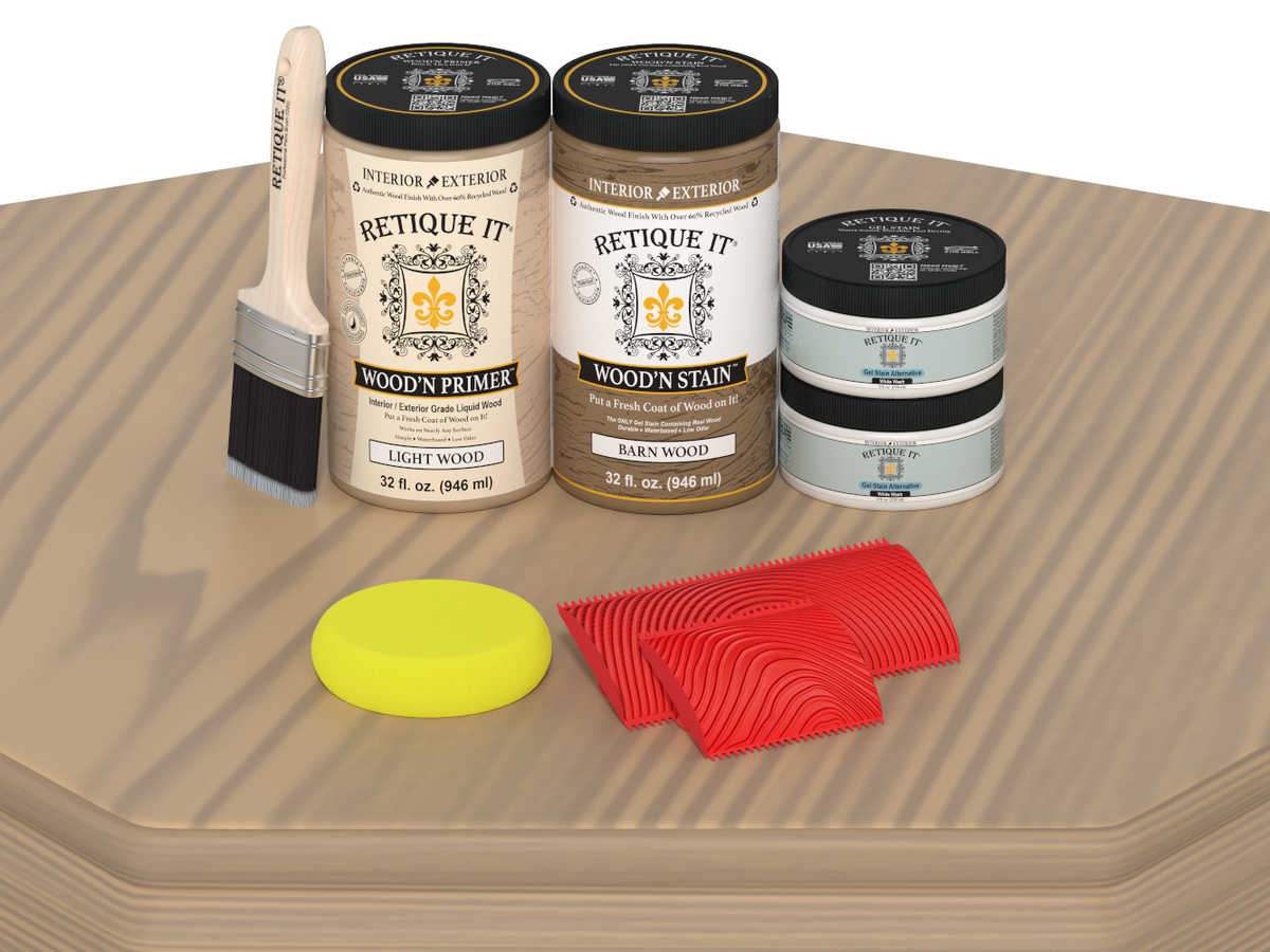 Woodworking products including a brush, jars of primer and stain, and samples on a wooden surface.