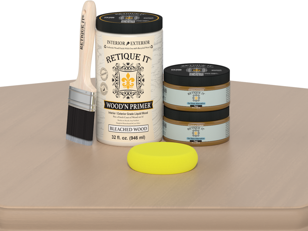 Retique It wood primer set with a brush, containers, and a sponge on a beige surface.