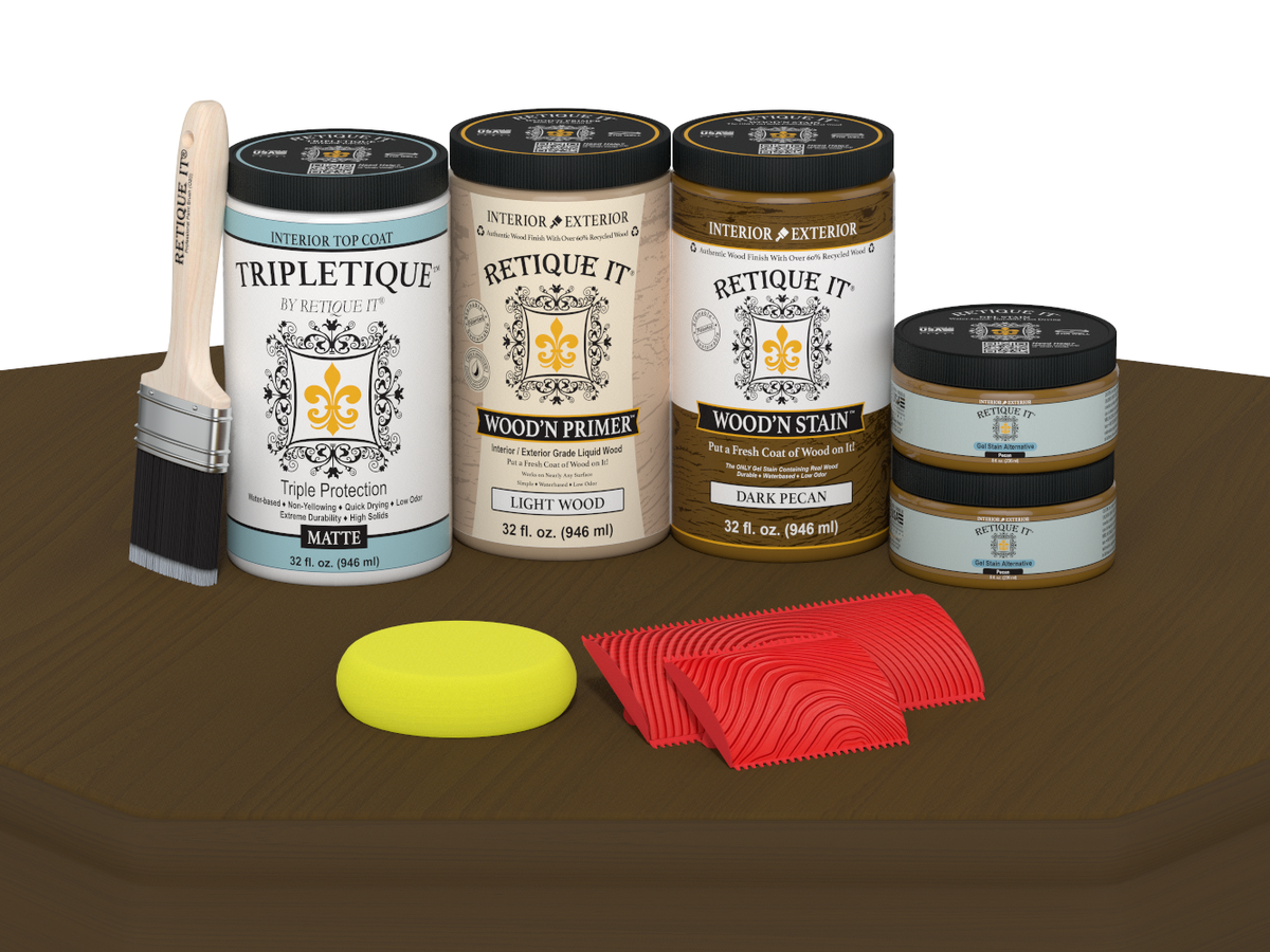 Collection of paint cans and tools on a brown surface