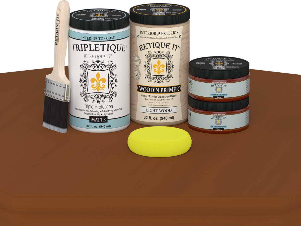 Paint cans and a brush on a brown surface with a white background