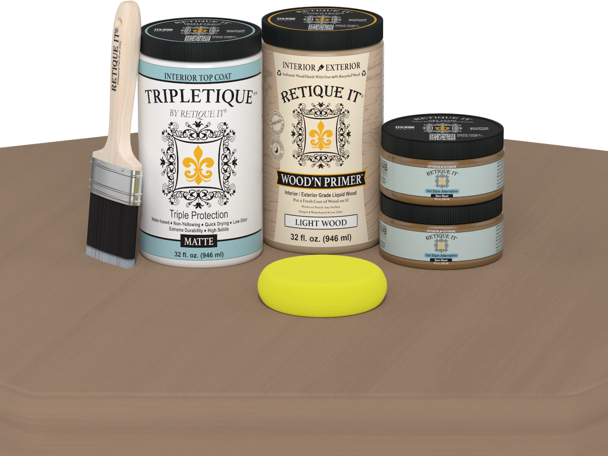 Collection of paint cans and a brush on a brown surface with a white background