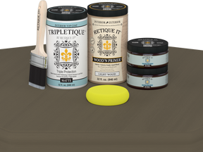Paint cans and a brush on a brown surface with a white background