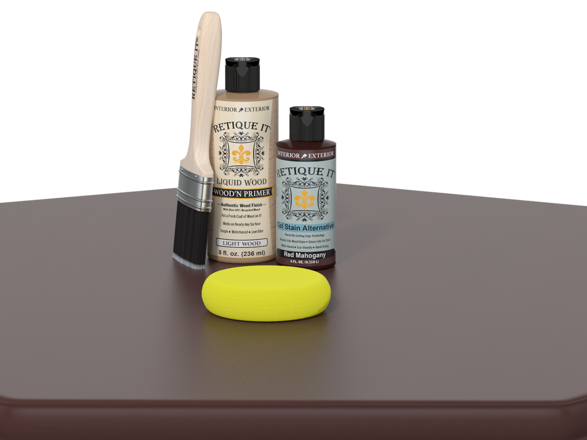 Set of painting supplies including a brush, bottles, and a sponge on a gray surface.