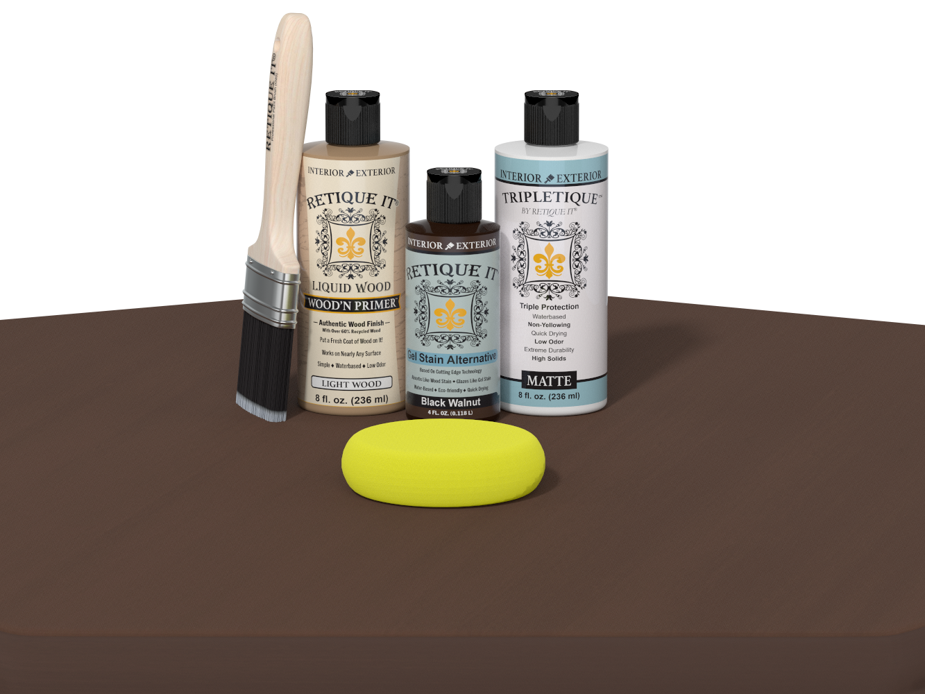 Collection of art supplies including bottles, a brush, and a sponge on a brown surface.