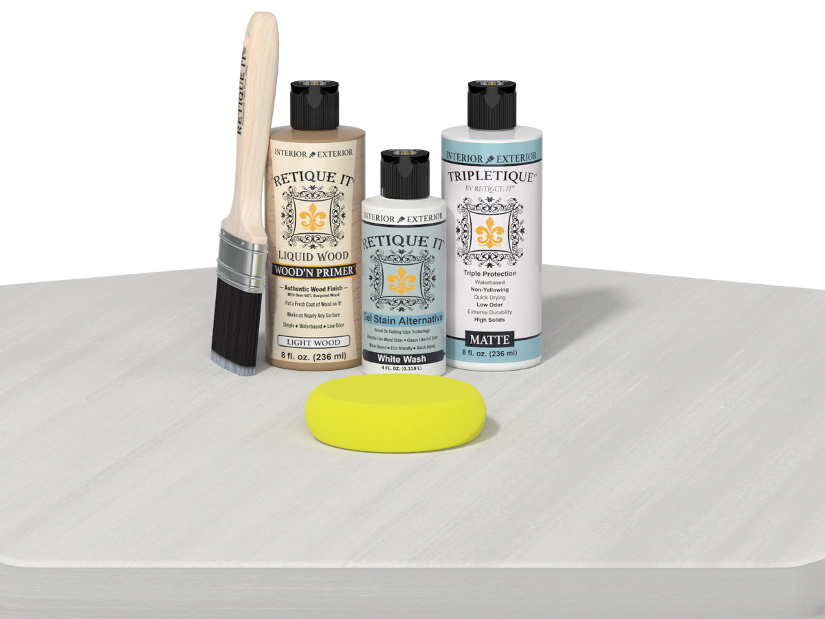Set of Etickette wood care products including bottles, a brush, and a sponge on a white surface.