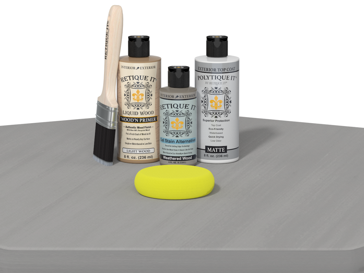 Set of Eticketit wood care products including bottles, a brush, and a yellow sponge on a gray surface.