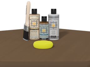 Collection of Eticketit paint bottles and tools on a brown surface