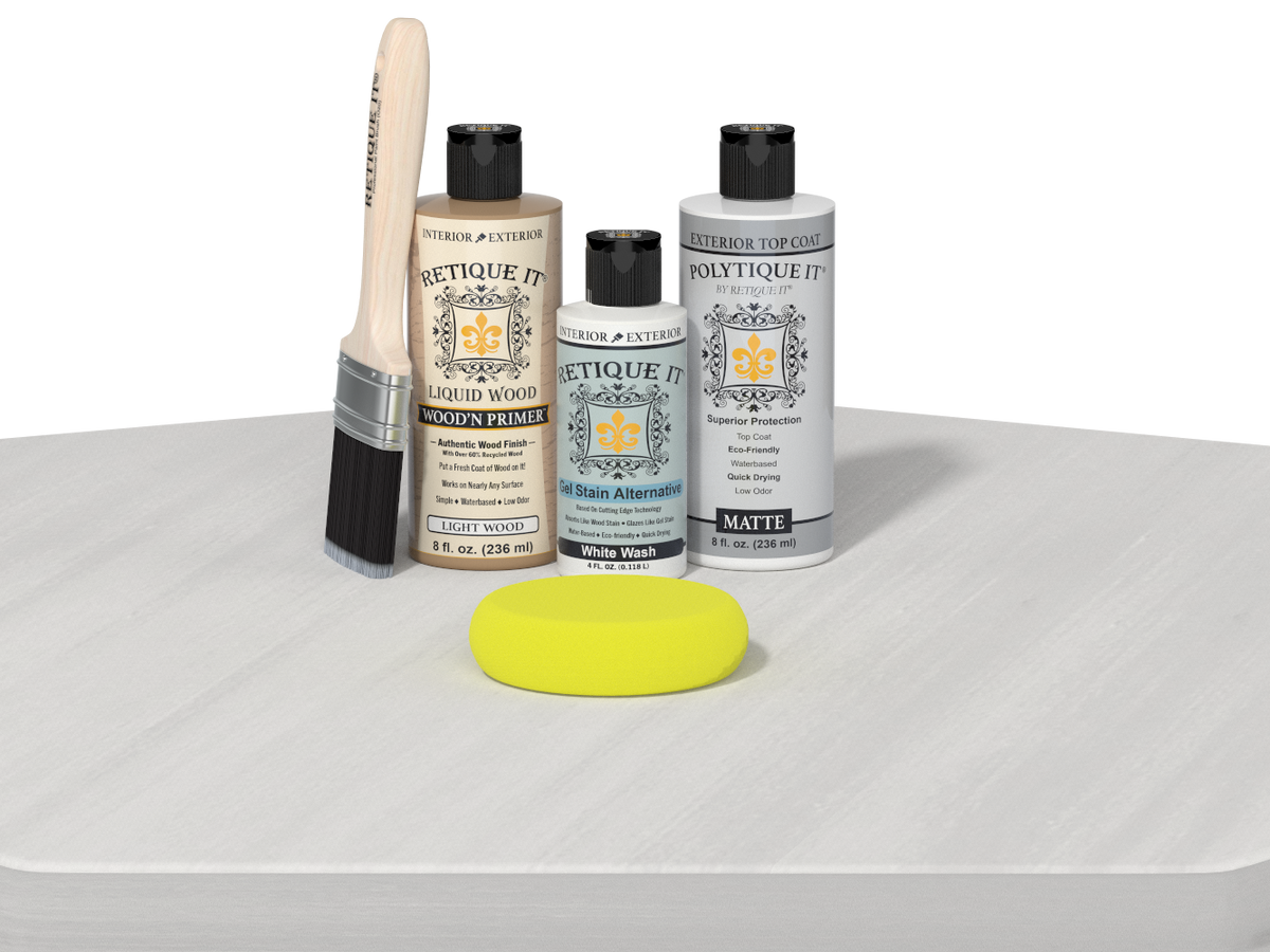 Set of Etiquette It! wood care products including bottles, a brush, and a yellow sponge on a white surface.